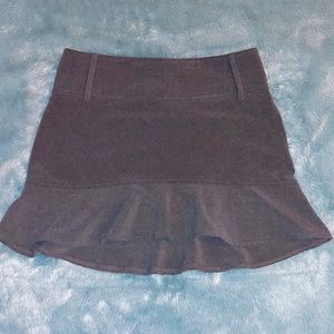 Tracy Evans gray mini skirt with wide belt loops. Junior's size 1
